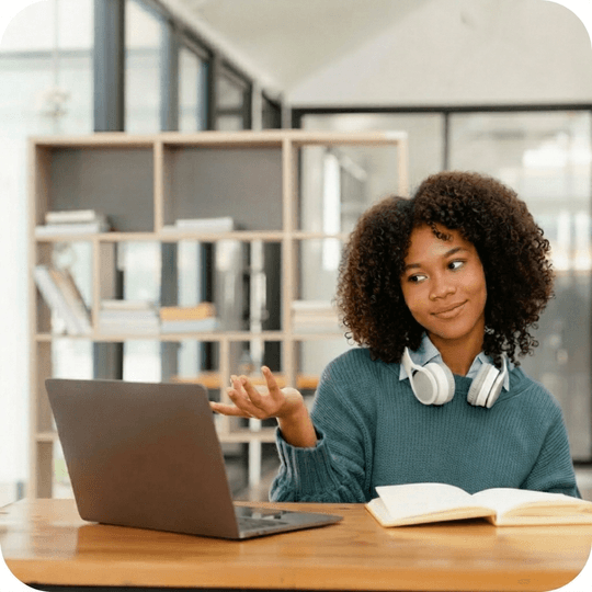 A student advisor meeting with a student over video